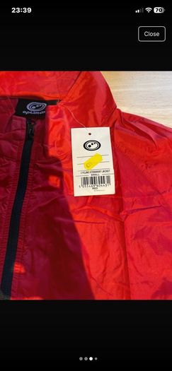 Cycle stowaway jacket. Brand Opitmum