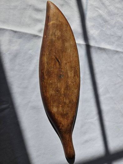Hand-carved leaf-shaped bow