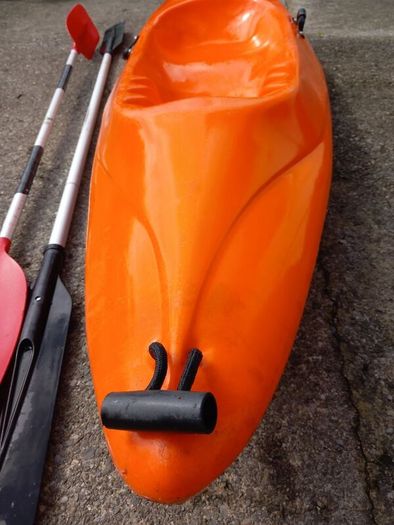 Kayak plus 2 paddles and 2 bouyancy aides