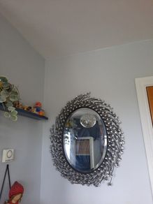 large black and crystal oval mirror