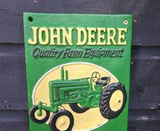 John deer cast iron sign