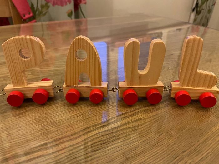 Assortment of wooden letters on wheels