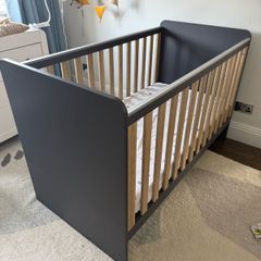 Next navy and pale oak cotbed