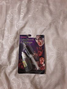 fake blood and syringe