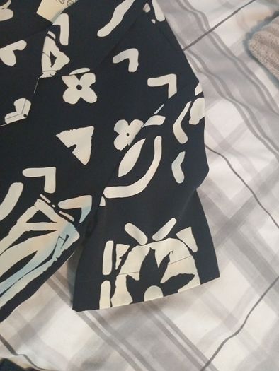 Short sleeve blazer style top