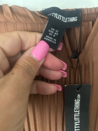 Pretty Little Thing midi dress. New. Fit size 10.