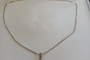 silver chain and pendant