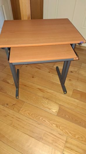 Computer desk with sliding keyboard tray