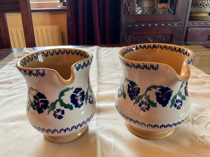 Nicholas Mosse two pansy jugs .  Both 4 inches  in height