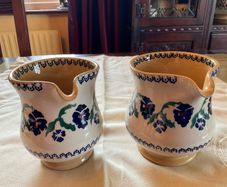 Nicholas Mosse two pansy jugs .  Both 4 inches  in height