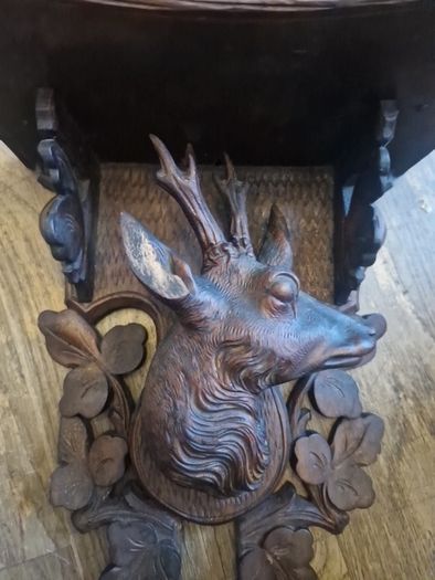 antique carved stag shelf