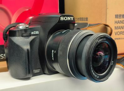 Sony Alpha A230 10.2 MP Digital SLR Camera with 18-55mm Lens With Battery Charger