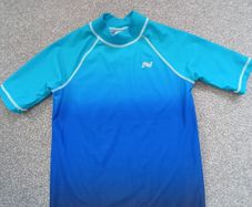 NEXT boy's swim top. Age 7