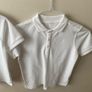 2 dunnes white polo shirts (as new) age 9-10 Image 3