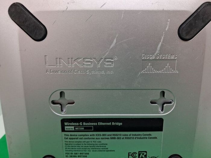 Postage - Linksys Cisco WET200 Wireless Ethernet Bridge Router.