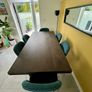 Stylish modern dining table in good condition. Image 3
