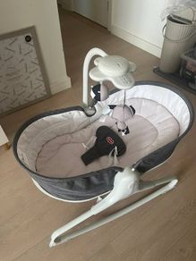 Tiny Love baby rocker/bouncer with an electronic mobile.free delivery