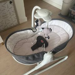 Tiny Love baby rocker/bouncer with an electronic mobile.free delivery