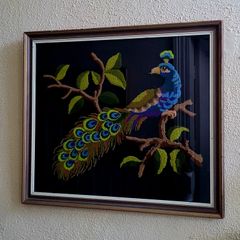 Vintage framed punch needle embroidered peacock