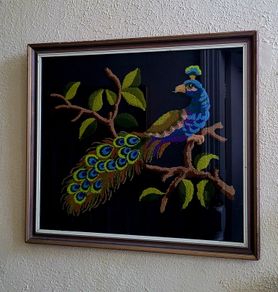 Vintage framed punch needle embroidered peacock