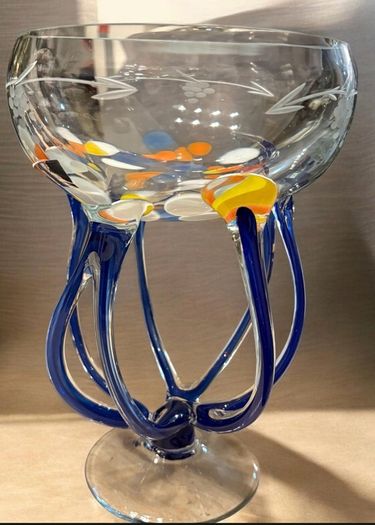 Beautiful, colorful vintage crystal piece with a unique design.