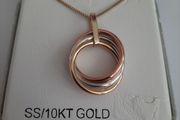 New 10kt gold and sterling silver pendant and chain