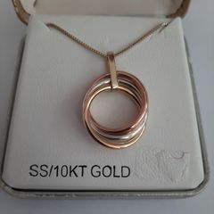 New 10kt gold and sterling silver pendant and chain