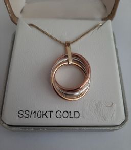 New 10kt gold and sterling silver pendant and chain