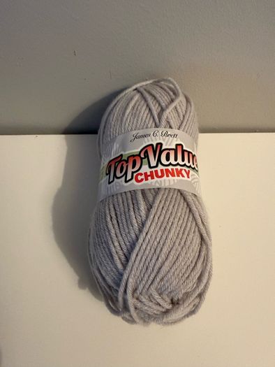 5 balls of grey yarn wool