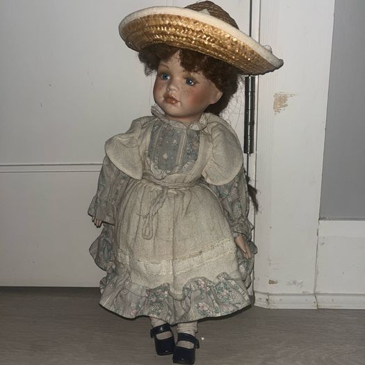 Leonardo Collection porcelain doll