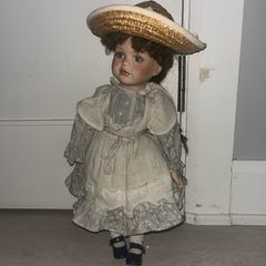 Leonardo Collection porcelain doll