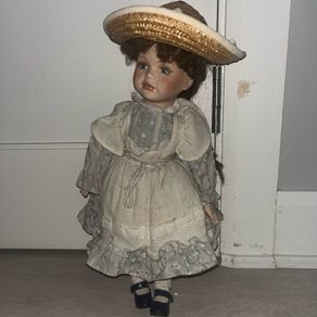 Leonardo Collection porcelain doll
