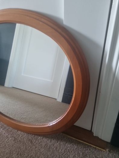 Wooden oval mirror