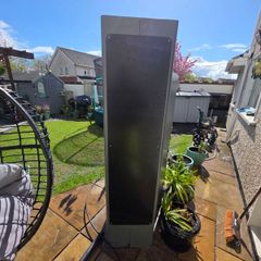 Steel unit/dispenser. Lockable door and comes with unused wheels still in packet inside.