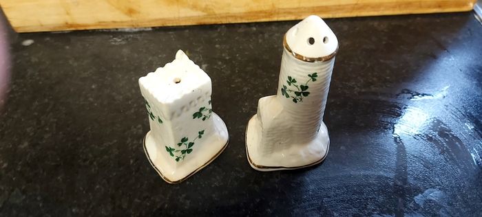 salt and pepper carrigaline pottery,cork Ireland shamrock set gold rim ,nice condition,buyer collects or pays postage thank you, sold as is