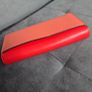 Michael Kors red and pink wallet with gold-tone MK logo. Multiple card slots and a zipped coin compartment. In perfect condition apart from some minor wear inside, which is not noticeable when using it, as shown in the photos. Image 5