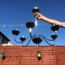 Two chandeliers for sale. Both in good condition. One of the cups is damaged (see photos for better description) not noticeable when hung. Everything else in good condition Image 4