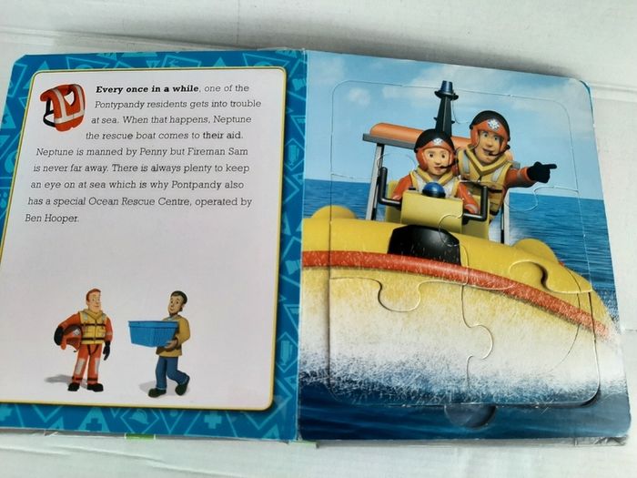 Vintage fire engine with play people and fireman Sam jigsaws