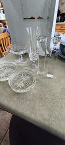 4 DIFFERENT ITMES- 1- Waterford Vintage Glandore Footed Candy Dish/ Compote 38.00 euro. 2- Set of 2 tipperary Vintage crystal Glass Coasters 18.00 euro. 3- Dublin Crystal bud vase 12.00 euro. 4- Nambe Lead Crystal Kissing Candle Sticks New 7 Inches Tall 1
