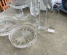 4 DIFFERENT ITMES- 1- Waterford Vintage Glandore Footed Candy Dish/ Compote 38.00 euro. 2- Set of 2 tipperary Vintage crystal Glass Coasters 18.00 euro. 3- Dublin Crystal bud vase 12.00 euro. 4- Nambe Lead Crystal Kissing Candle Sticks New 7 Inches Tall 1