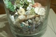 Glass vase with coloured stones
