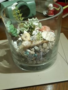 Glass vase with coloured stones