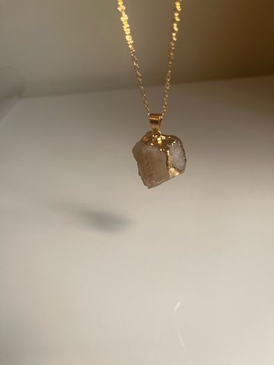 Costume necklace with stone pendant