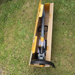 Titan grass strimmer.