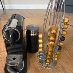 Nespresso coffee machine including milk frother