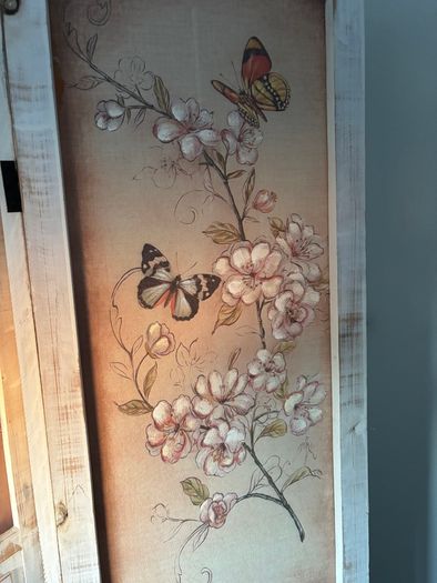 Three-panel room divider with floral and butterfly print