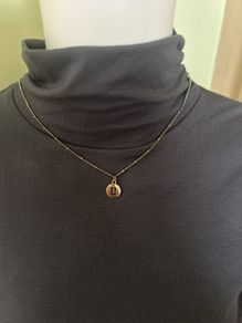 Gold tone rustic chain necklace with Gemini sigh