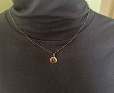 Gold tone rustic chain necklace with Gemini sigh
