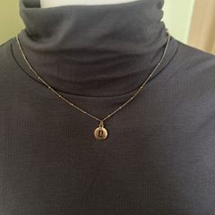 Gold tone rustic chain necklace with Gemini sigh