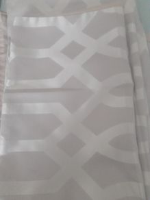As new Double duvet cover and pillow cases .Taupe /Beigh colour  with  cream /silver  pattern ..Satiny material on the front and cotton on the back .Also double beigh sheet and pillow cases .Only used on a spare bed and washes great dont need to iron  it 